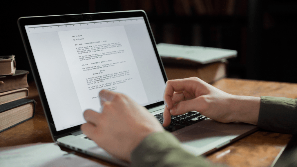 woman typing on her laptop