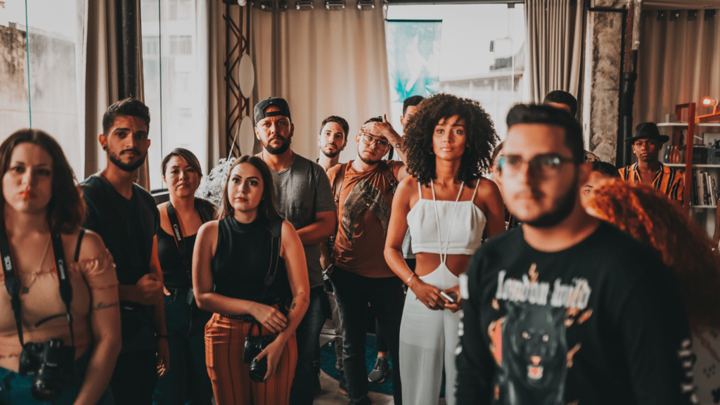 a group of people holding a camera