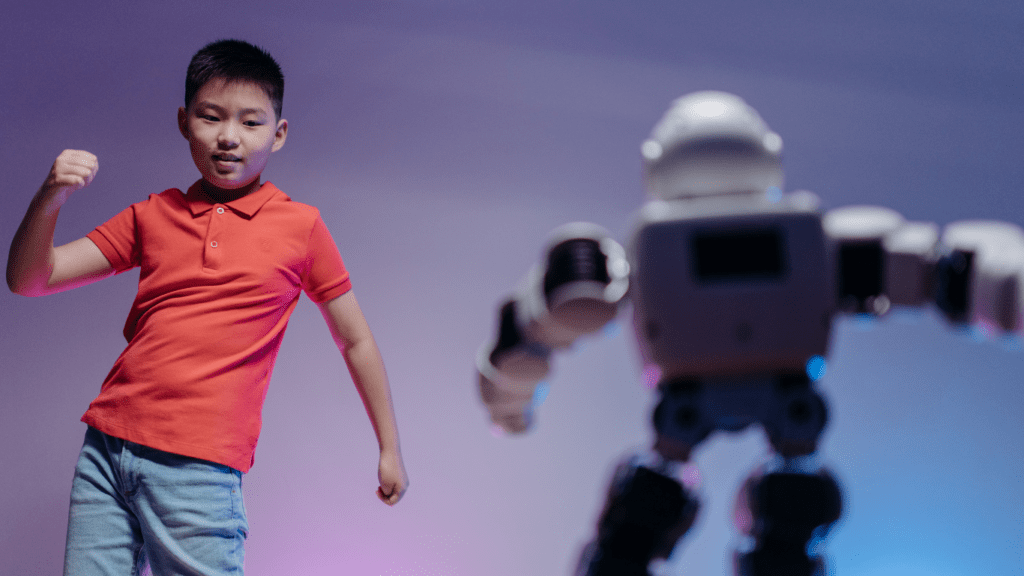 a robot is standing in front of a computer screen